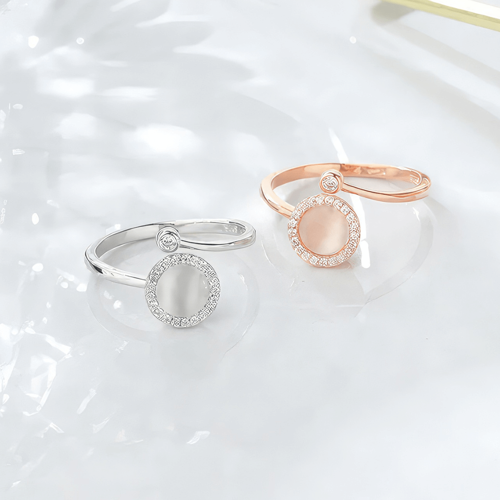 Fidget rings womens silver and gold on a white surface