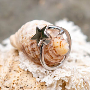 Moon and star ring for fidgeting sterling silver on a shell