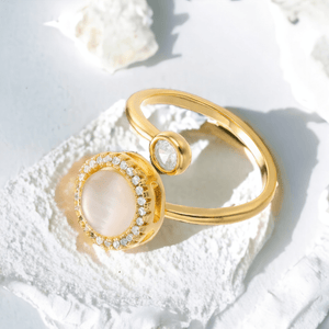 Opal fidget ring womens on a white stone on white background
