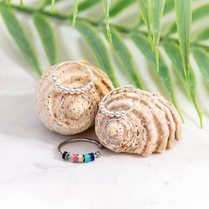 Serenity set bundle of 3 fidget rings anxiety on a shell close up