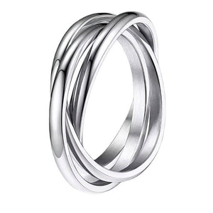 Silver ring with interlocking bands on a white background