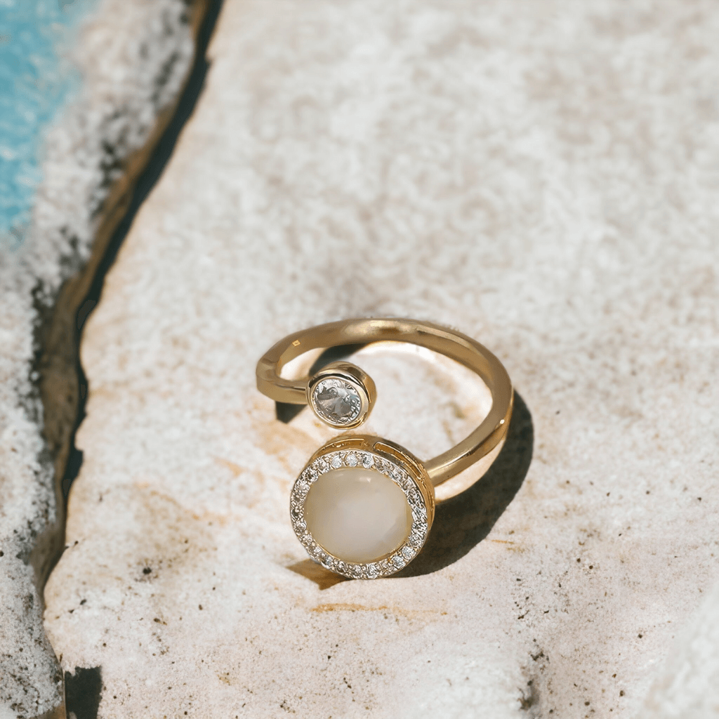 A sterling silver fidget ring with an opal top on a stone in Australia
