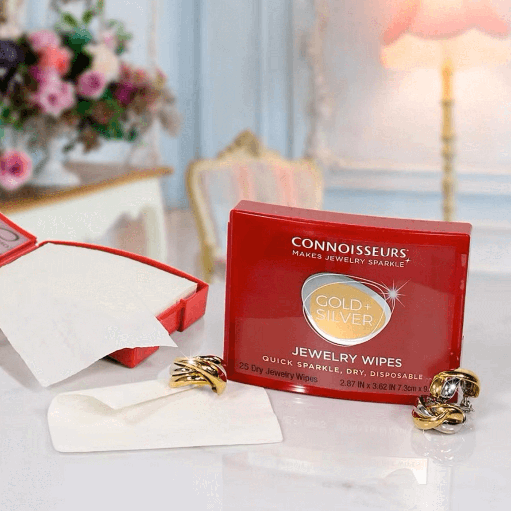 Two boxes of Jewelry Cleaning Wipes by Connoisseurs on a white surface