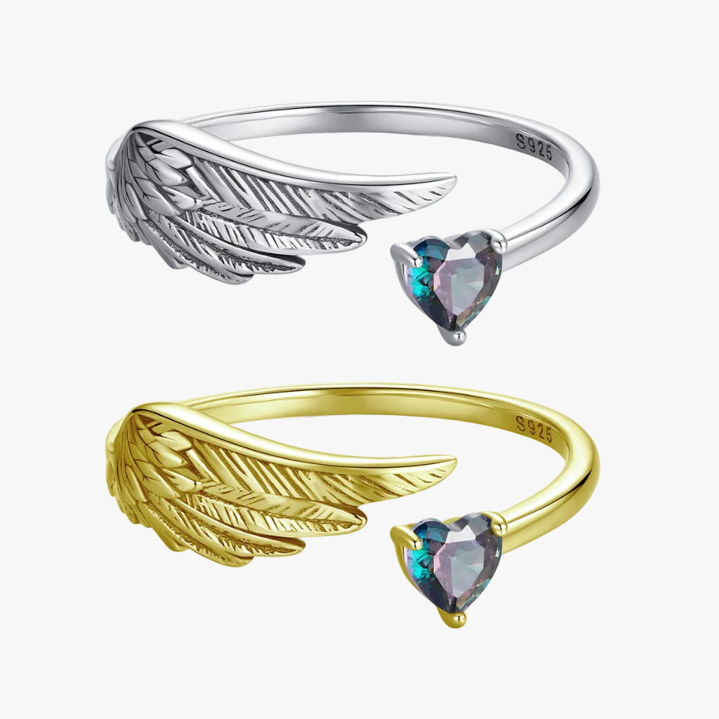 sterling silver and gold angel wing ring with heart shaped cubic zirconia