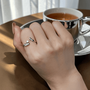 sterling silver kitten cat ring with heart shaped cubic zirconia adjustable ring worn on hand