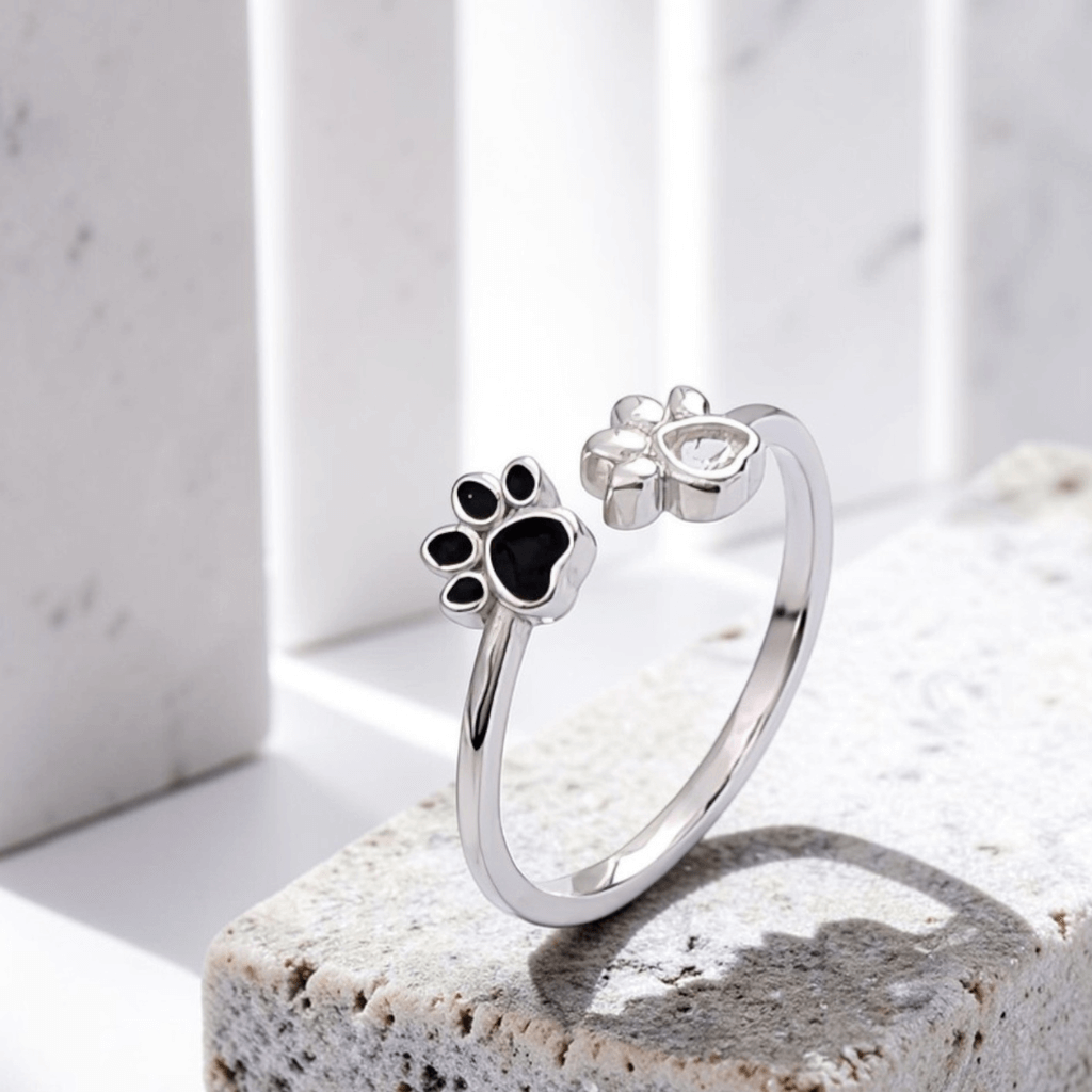 sterling silver paw print anxiety ring with black enamel paw and heart cubic zirconia dog ring jewelry