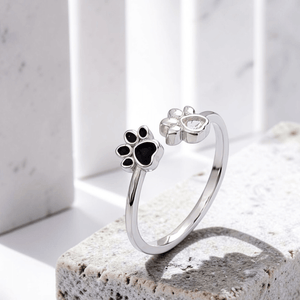 sterling silver paw print anxiety ring with black enamel paw and heart cubic zirconia dog ring jewelry