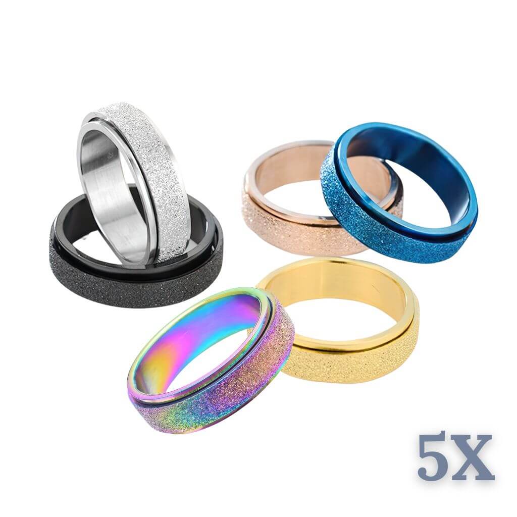 6 sparkly worry rings on white background