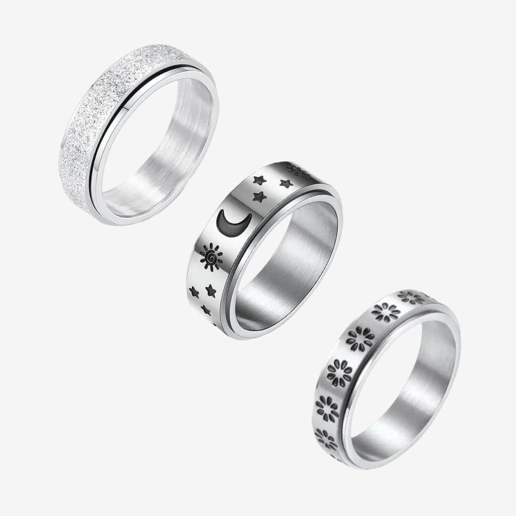 Calming classics bundle of 3 stainless steel band fidgeting rings on white background