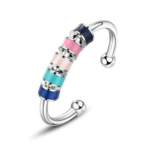 Colourful fidget ring with beads on white background