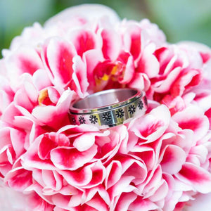 Daisy ring on a pink flower