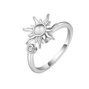 Findget ring for anxiety with sun spinning top on white background