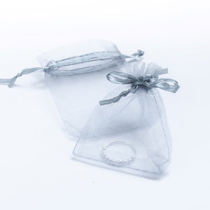 Ring for anxiety made of sterling silver in an organza bag