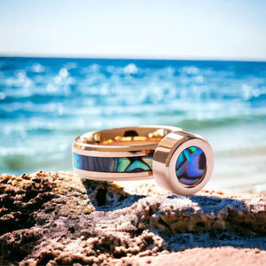 Shell jewellery tungsten rose gold ring on a beach